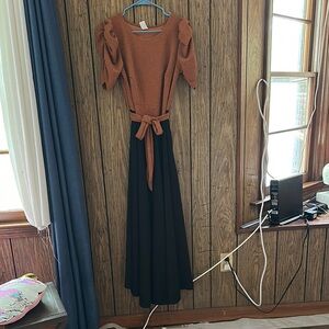 Elegant Orange and Black Dress with Puff Sleeves